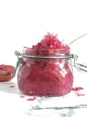 A jar of red cabbage sauerkraut.